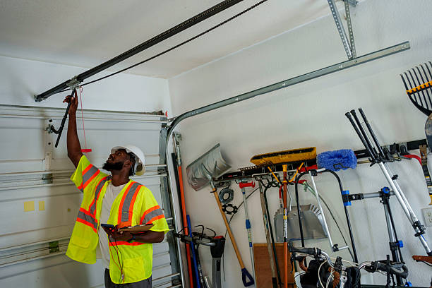 Professional Garage Door Roller Replacement technician working in Franklin, MI